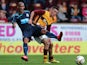 Newcastle United's Yoan Gouffran and Motherwell's Simon Ramsden battle for the ball during a pre-season friendly on July 16, 2013