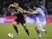 Celta's Alex Lopez tries to tackle Mesut Ozil during the La Liga match against Real Madrid on March 10, 2013
