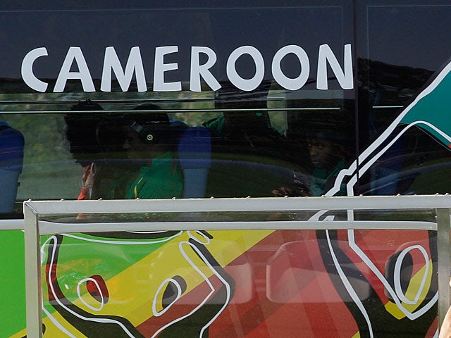 The Cameroon national team arrive by coach to a training session prior to the World Cup in South Africa on June 12, 2010