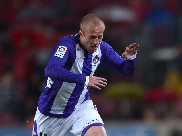 Valladolid's Daniel Larsson runs for the ball during the match against FC Barcelona on May 19, 2013
