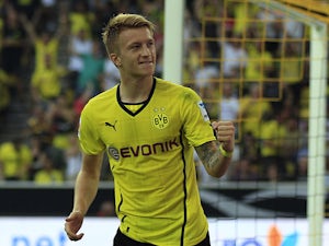 Dortmund's Marco Reus celebrates after scoring during the Super cup match on July 27, 2013