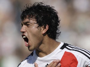 River Plate's Gustavo Cabral celebrates his goal against Chacarita Juniors during an Argentina soccer league game on August 30, 2009