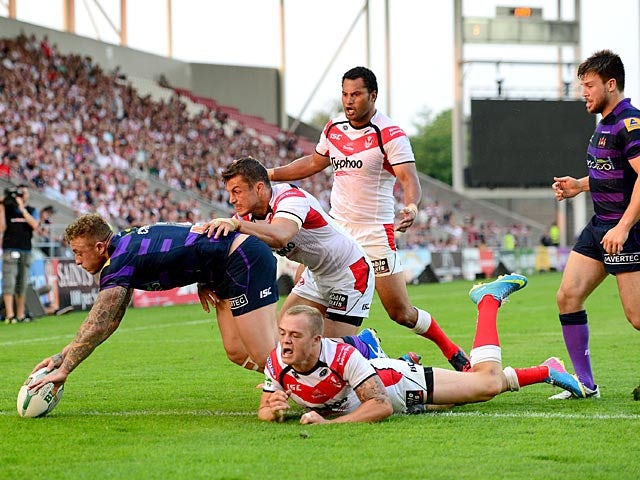 Wigan Warriors' Josh Charnley goes over to score a try against St Helens on July 22, 2013