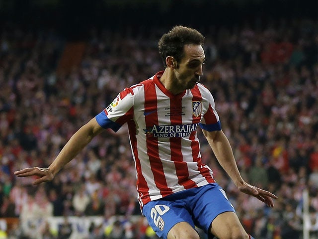 Atletico Madrid's Juanfran during a Copa del Rey match against Real Madrid on May 17, 2013
