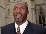 Former British sprinter Linford Christie outside the High Court.