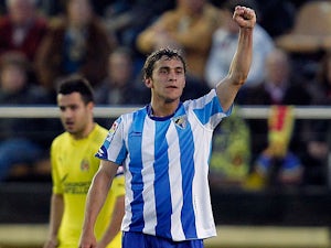 Malaga's Sebastian Fernandez celebrates his goal on February 20, 2011