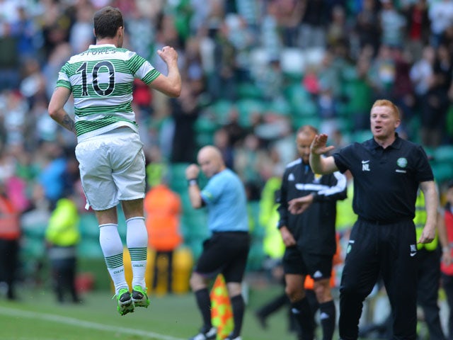 Anthony Stokes of Celtic celebrates scoring his second goal of the day with manager Neil Lennon during the Scottish Premier League game between Celtic and Ross County on August 3, 2013