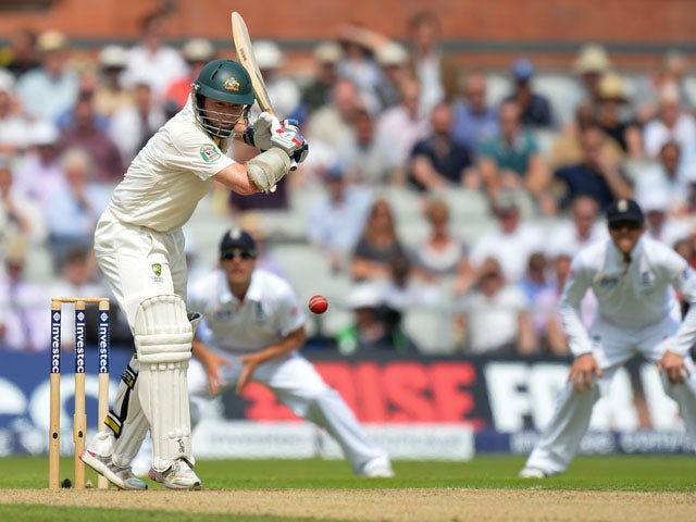 Australia's Chris Rogers plays a shot during play on the first day of the third Ashes cricket test match between England and Australia on August 1, 2013