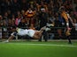 Brumbies' Christian Lealiifano dives in to score a try against the Chiefs during the Super Rugby Final on August 3, 2013