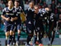 Ross County's Darren Maatsen is congratulated by team mates after scoring the opening goal against Celtic on August 3, 2013