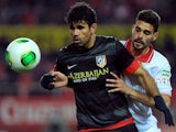 Diego Costa keeps control of the ball against Sevilla.