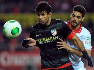 Costa brace helps Atletico edge Sevilla