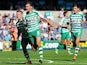 Yeovil's Edward Upson celebrates with team mates after grabbing a late winner against Millwall on August 3, 2013