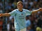 Elano of Manchester City celebrates scoring his team's third goal during the Barclays Premier League match between Manchester City and West Bromwich Albion at the City of Manchester Stadium on April 19, 2009