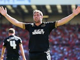 Wigan's Grant Holt celebrates after scoring his team's second goal during the match against Barnsley on August 3, 2013