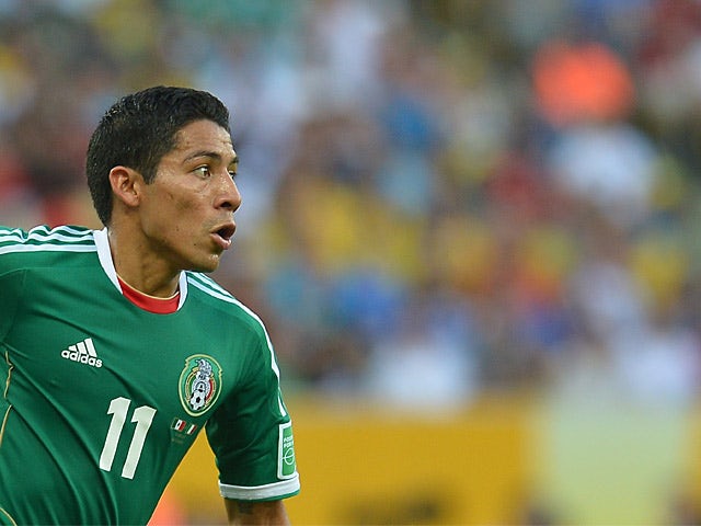 Mexico's Javier Aquino in action during the Confederations Cup against Italy on June 16, 2013