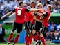 Ipswich's Jay Tabb is mobbed by team mates after scoring the opening goal against Reading on August 3, 2013