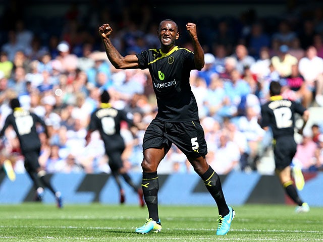 Sheffield Wednesday's Kamil Zayatte celebrates after scoring the opening goal against QPR on August 3, 2013