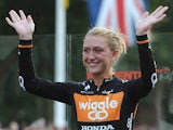 Laura Trott waves to fans as she celebrates winning the Pro Women's Grand Prix during the Prudential RideLondon on August 3, 2013