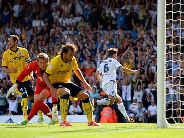 Leed's Luke Murphy celebrates moments after scoring the winner against Brighton on August 3, 2013