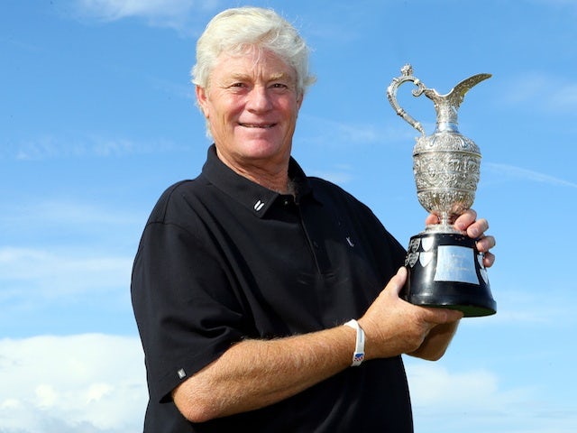 Mark Wiebe with the Senior Open Championship trophy on July 29, 2013