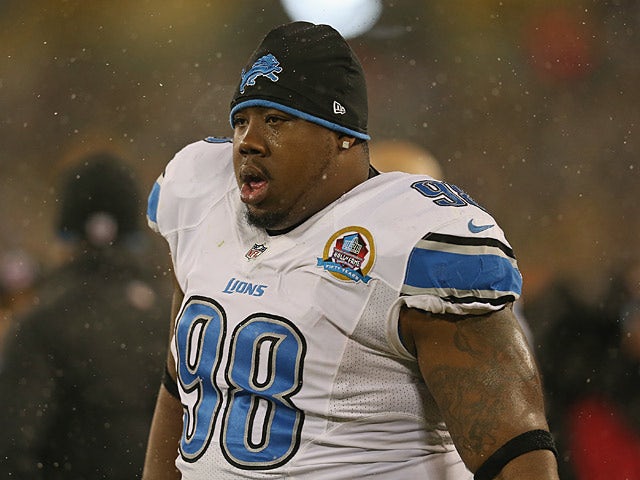 Detroit Lions' Nock Fairley watches his team from the sidelines on December 9, 2012