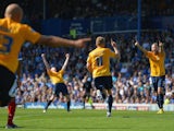 Alfie Potter of Oxford celebrates after scoring his side's third goal during the Sky Bet League Two match between Portsmouth and Oxford United on August 3, 2013