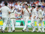 Australia's Ryan Harris celebrates with team mates after taking the wicket of England's Jonathan Trott during the third day of the 3rd Ashes Test on August 3, 2013
