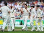 Australia's Ryan Harris celebrates with team mates after taking the wicket of England's Jonathan Trott during the third day of the 3rd Ashes Test on August 3, 2013