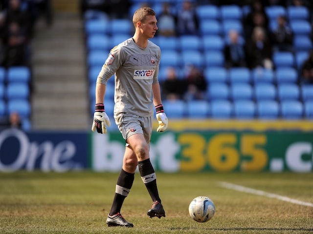 Simon Moore in action for Brentford on April 6, 2013