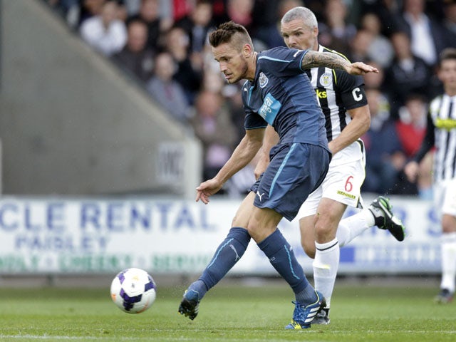 Newcastle United's Mathieu Debuchy scores during a pre-season friendly against St Mirren on July 30, 2013