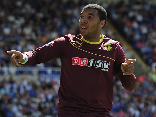 Watford's Troy Deeney celebrates after scoring the opening goal against Birmingham on August 3, 2013