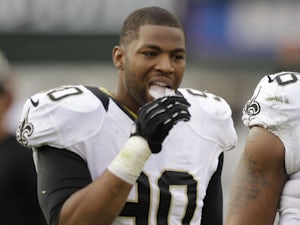 New Orleans Saints defensive end Turk McBride during the third quarter of the match against the Oakland Raiders on November 18, 2012