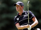 Webb Simpson in action during round one of the World Golf Championships on August 1, 2013