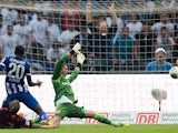 Hertha Berlin's Adrian Ramos scores the opening goal against Eintracht Frankfurt on August 10, 2013