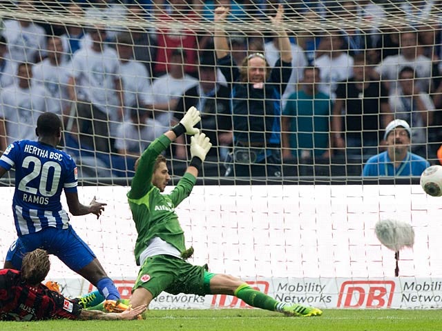 Hertha Berlin's Adrian Ramos scores the opening goal against Eintracht Frankfurt on August 10, 2013