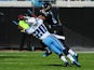 Alterraun Verner of the Tennessee Titans intercepts a pass intended for Cecil Shorts on November 25, 2012