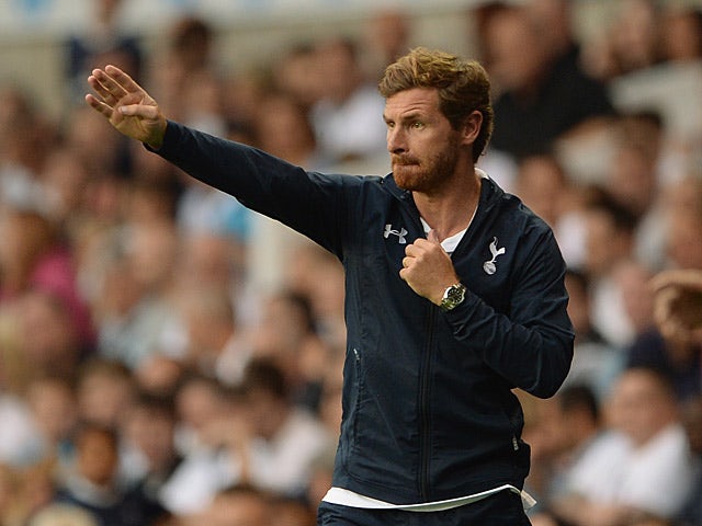 Tottenham manager Andre Villas-Boas gestures on the touchline during a friendly match against Espanyol on August 10, 2013