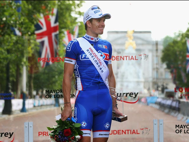 Arnaud Demare of France and FDJ stands on the podium after winning the London - Surrey Classic on August 4, 2013