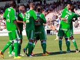 Saint-Etienne's Brandao is congratulated by team mates after scoring against Ajaccio on August 11, 2013