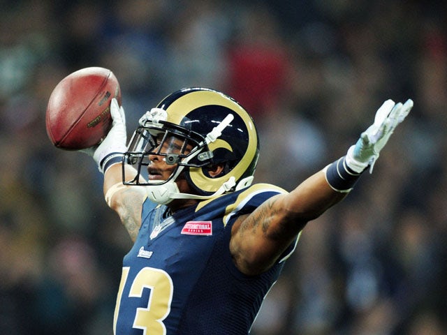 Chris Givens of the St. Louis Rams celebrates scoring the opening touchdown during the NFL International Series match between the New England Patriots and the St.Louis Rams on October 28, 2012