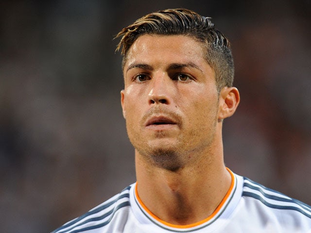 Cristiano Ronaldo of Real Madrid looks on prior to the Pre Season match between Olympique Lyonnais and Real Madrid on July 24, 2013
