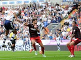 Bolton's Darren Pratley heads in the opening goal against Reading on August 10, 2013
