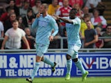 Coventry's Billy Daniels is congratulated by team mate Franck Moussa after scoring the winning goal against Bristol City on August 11, 2013