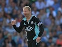 Surrey's Gareth Batty celebrates after taking the wicket of Kent's Samuel Billings during the T20 match on July 26, 2013