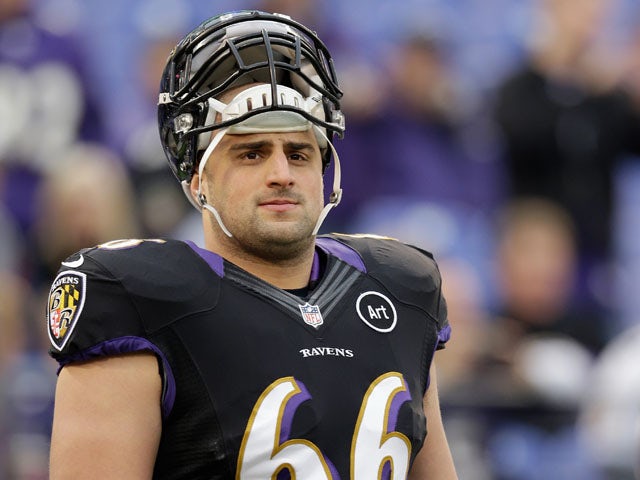 Guard Gino Gradkowski of the Baltimore Ravens looks on before the start of the Ravnes game against the Pittsburgh Steelers on December 2, 2012