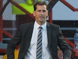 Dundee United manager Jackie McNamara reacts on the touchline during the match against Partick on August 2, 2013