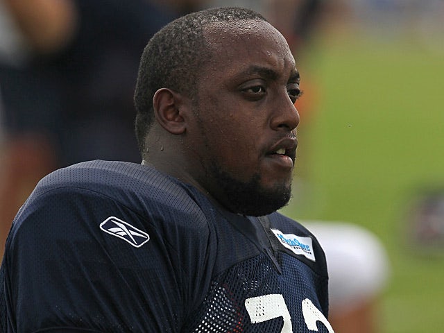 Chicago Bears' J'Marcus Webb rests during summer training camp on August 6, 2011