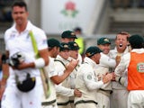 England's Kevin Pietersen walks off after being given out off the bowling of Australia's Peter Siddle