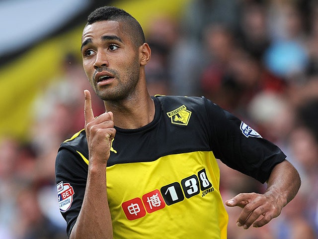 Watford's Lewis McGugan celebrates after scoring his team's fourth goal against Bournemouth on August 10, 2013